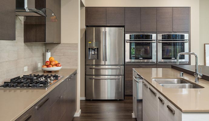 Clean kitchen with a refrigerator